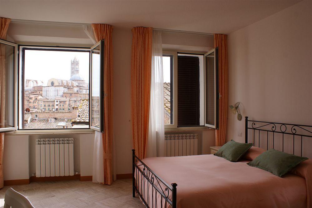 I Tetti Di Alojamento de Acomodação e Pequeno-almoço Siena